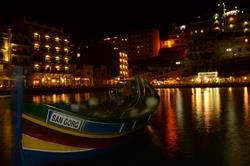 Gozo diving holiday. Xlendi Bay at night.